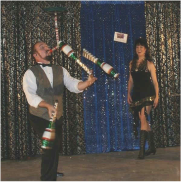 Markus Steelgrave is a juggler and fire eater as well as magician! Partner and wife Angelique assists.