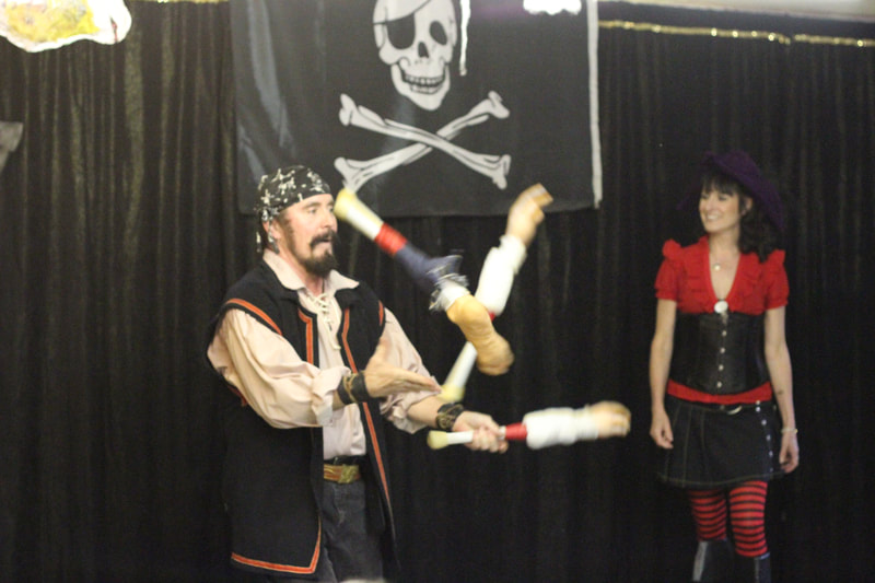 Pirate Markus Steelgrave juggles arms and legs in a comical routine for their Pirate show